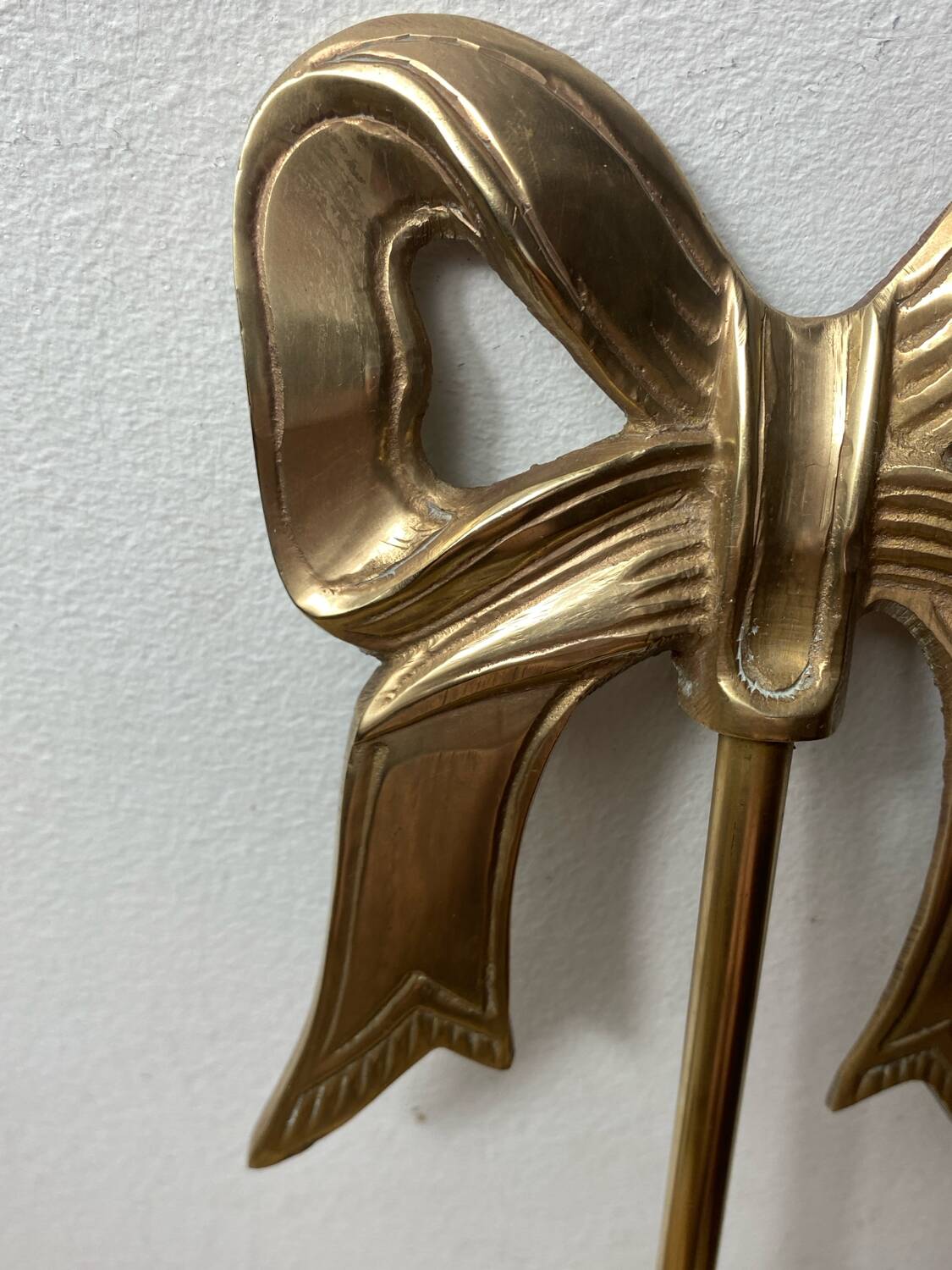 Solid brass bow and ribbon wall candle holder