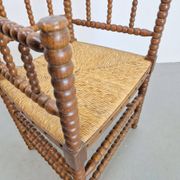 Mid-Century Arts and Craft Oak Bobbin Chair with Rush Seat, 1930s