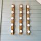 Set of three wall sconces in solid brass, 1970s-80s.