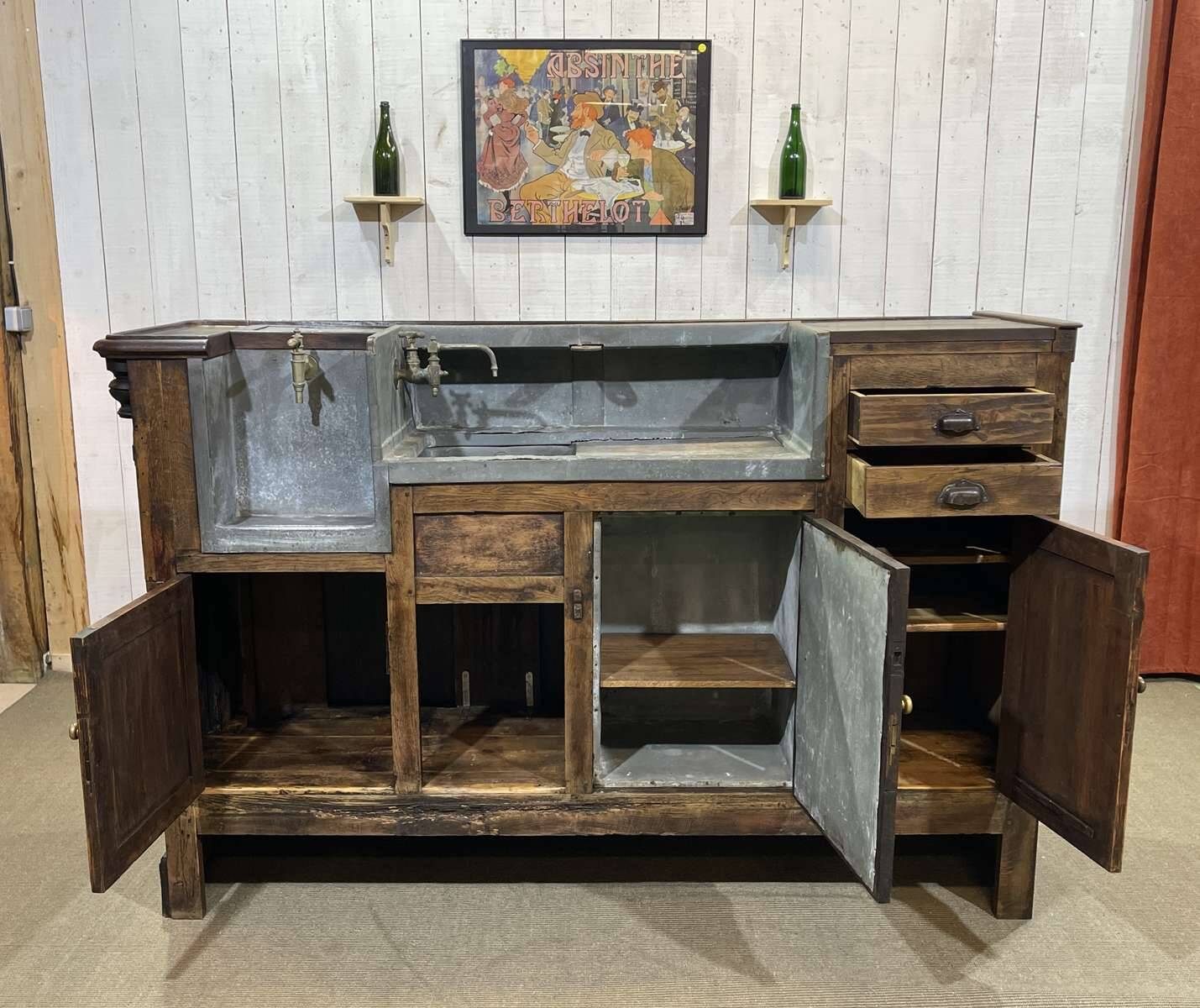 Comptoir de bar en chêne début XXème avec habillage d'époque zinc et étain