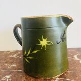 Antique Savoyard pottery pitcher in green with floral decoration