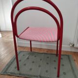Red lacquered tubular chair