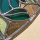 Tiffany stained glass mirror with plant decoration signed B. Nogaro