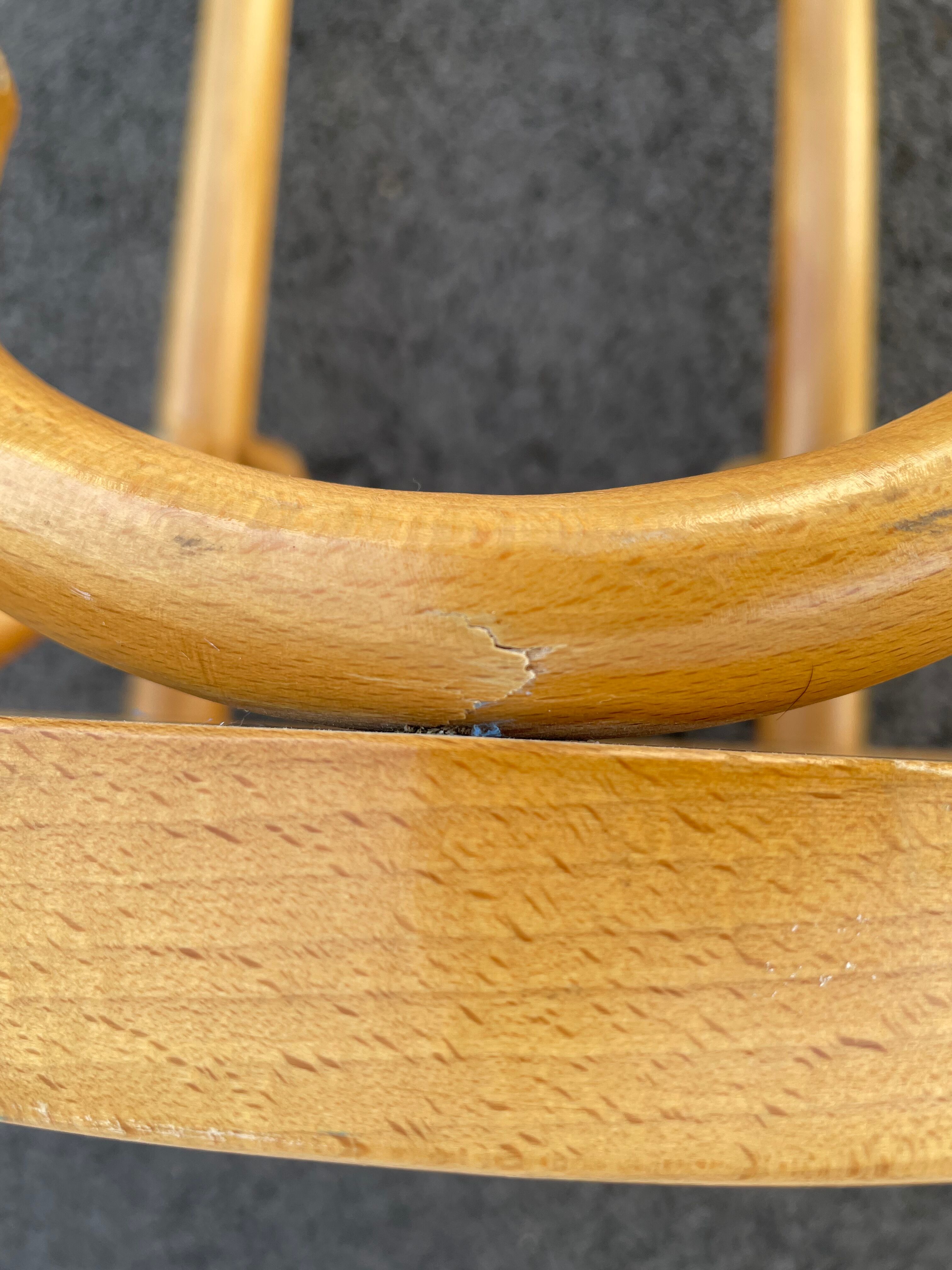 Curved wooden bar stool