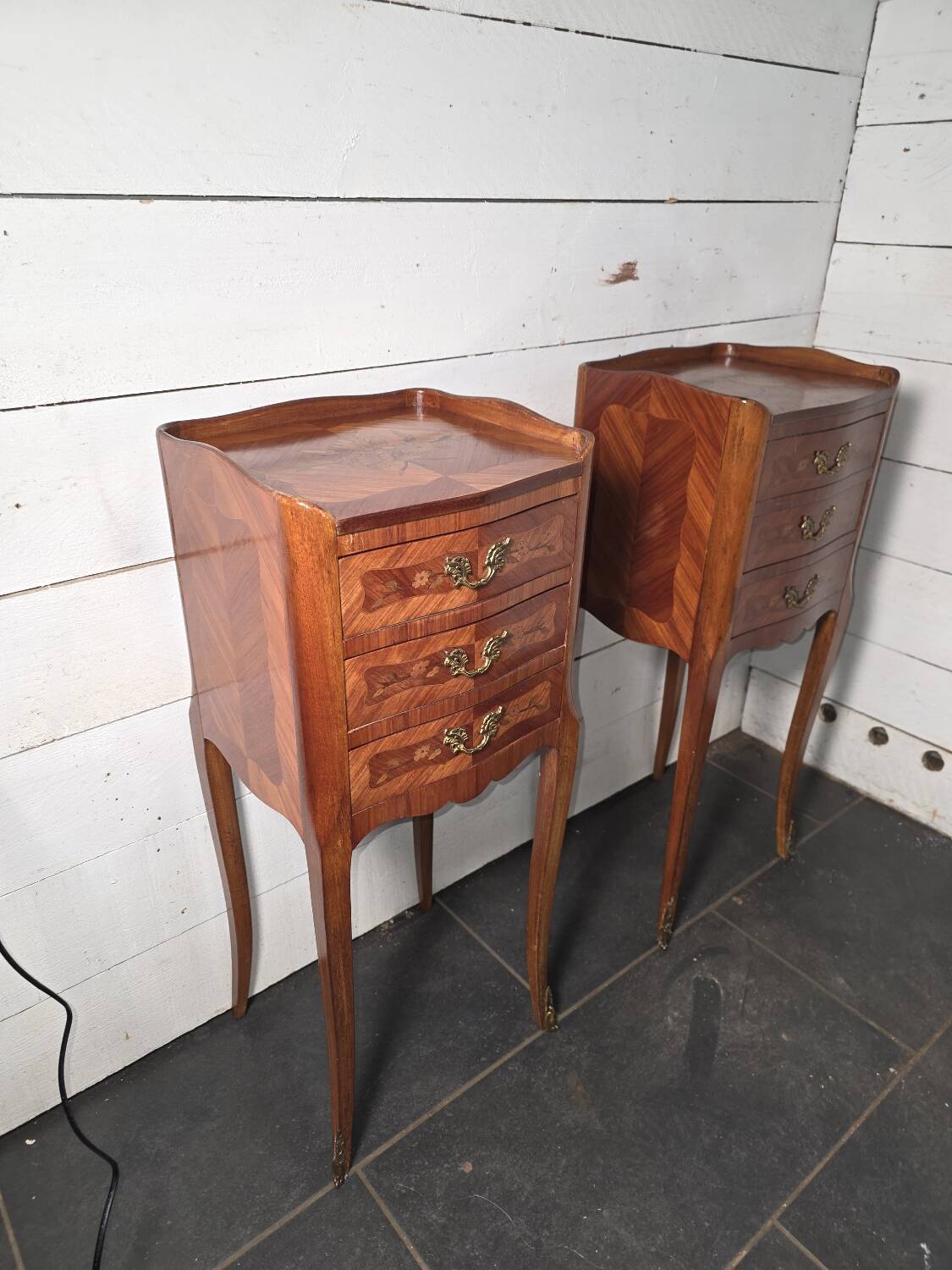 Pair of Louis XV style bedside tables in marquetry.