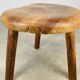 Brutalist tripod stool in solid wood