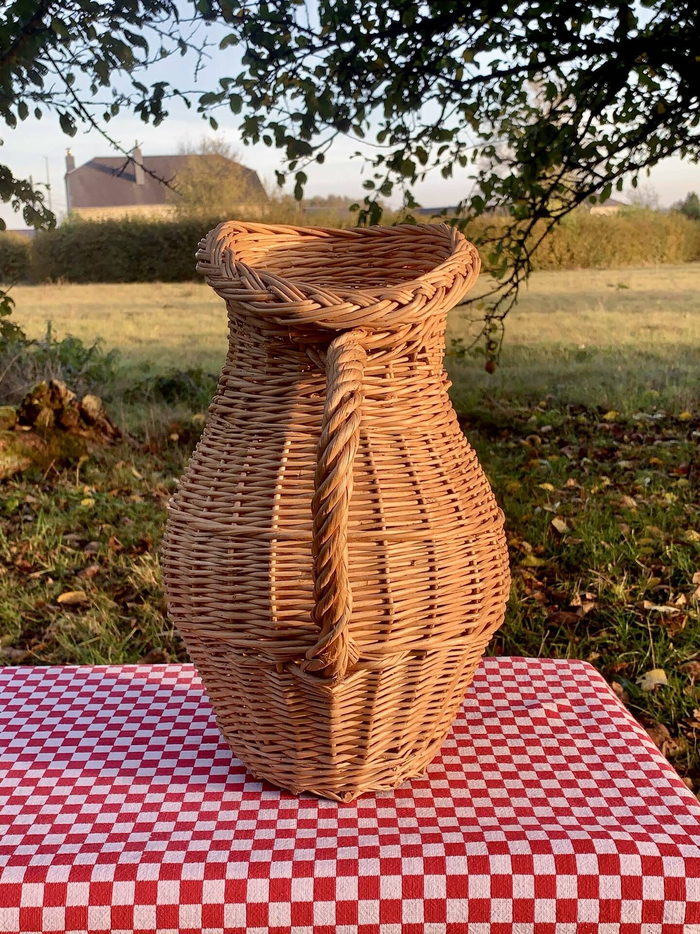 Large vintage wicker jug