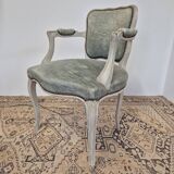 Louis XV style cabriolet armchair in patinated wood and velvet