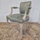 Louis XV style cabriolet armchair in patinated wood and velvet