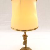 Lampe à poser cherubin en laiton.
