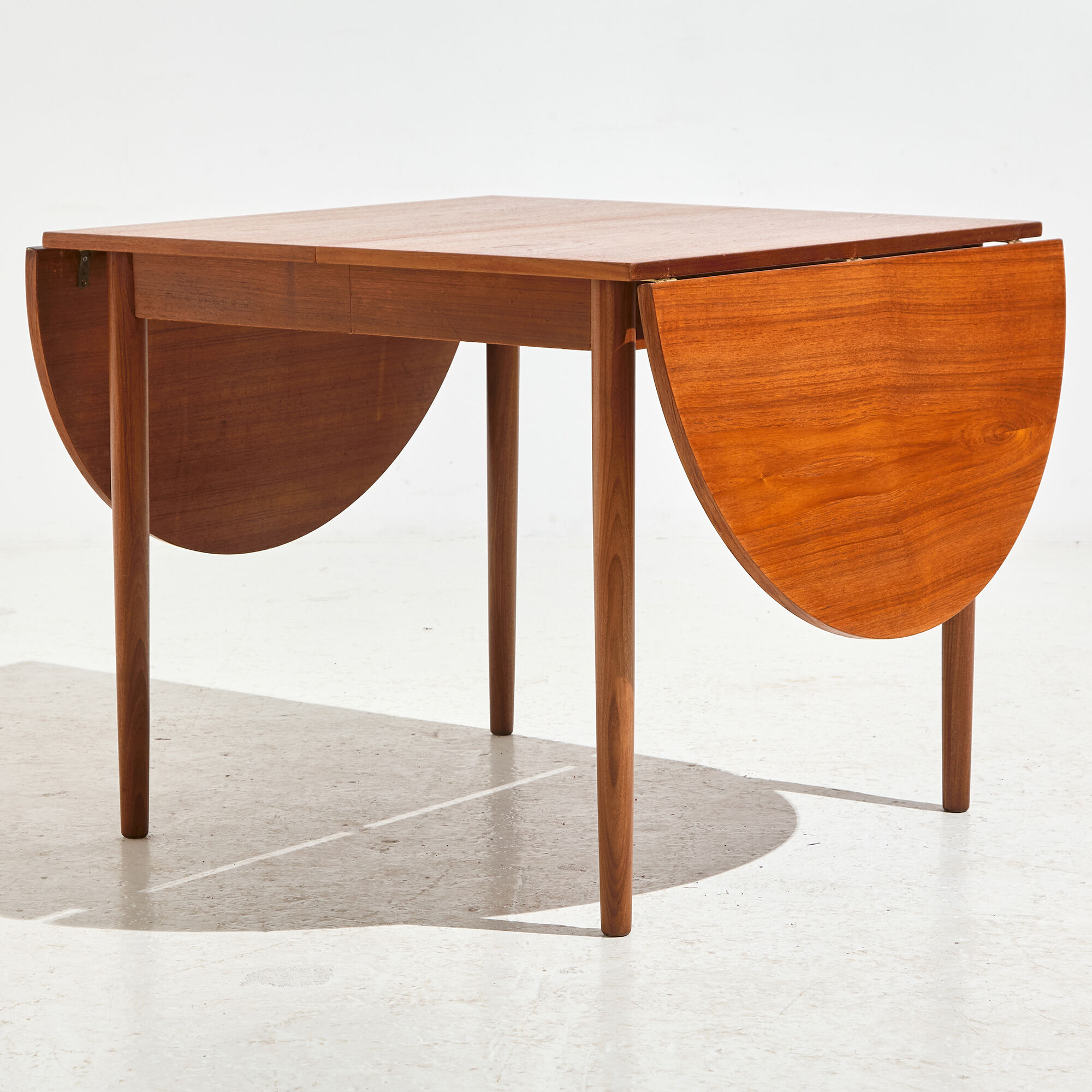 Restored teak dining table