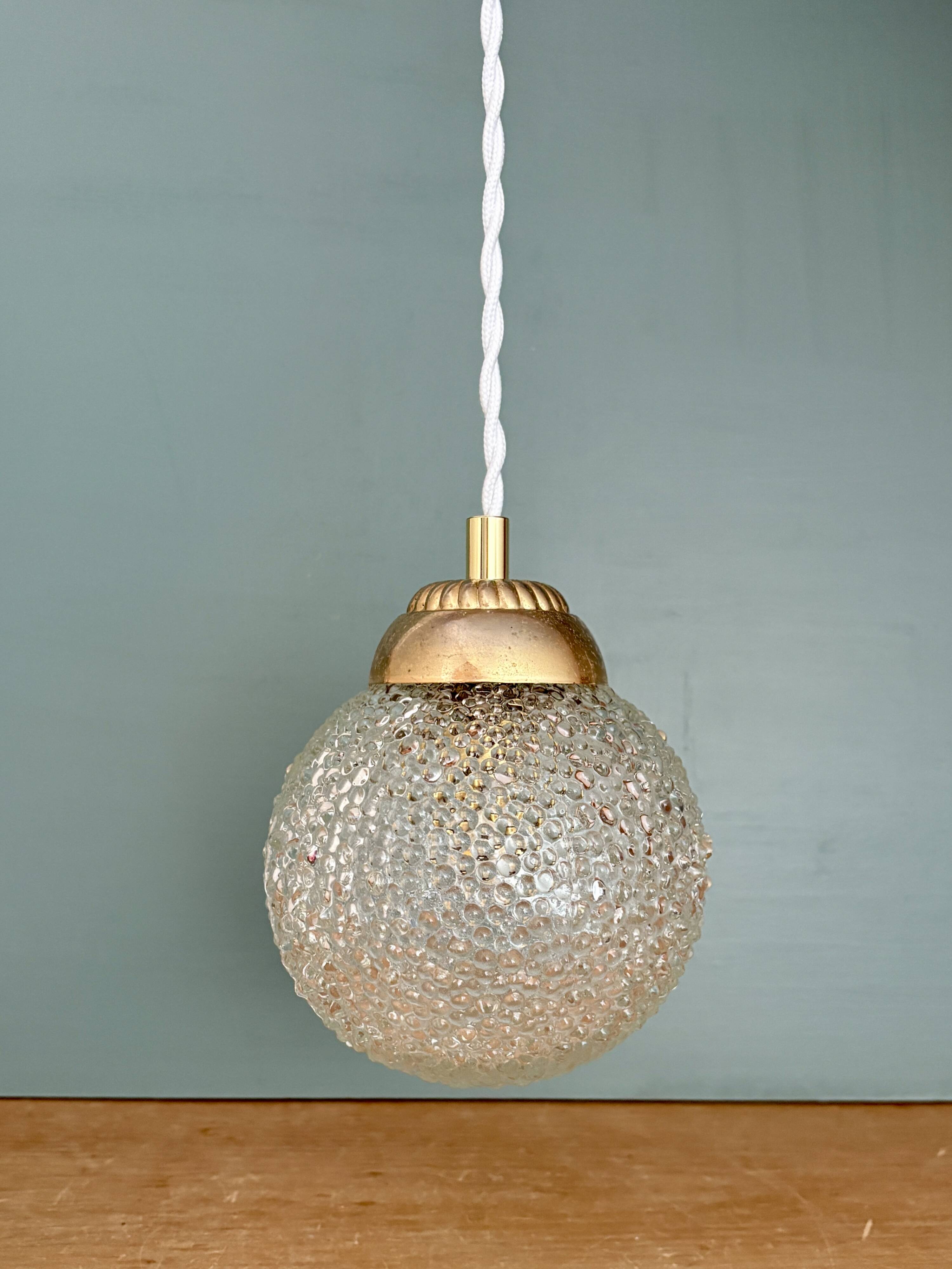 Vintage globe pendant light in molded glass
