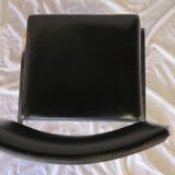 Modernist chair in chromed metal and black imitation leather