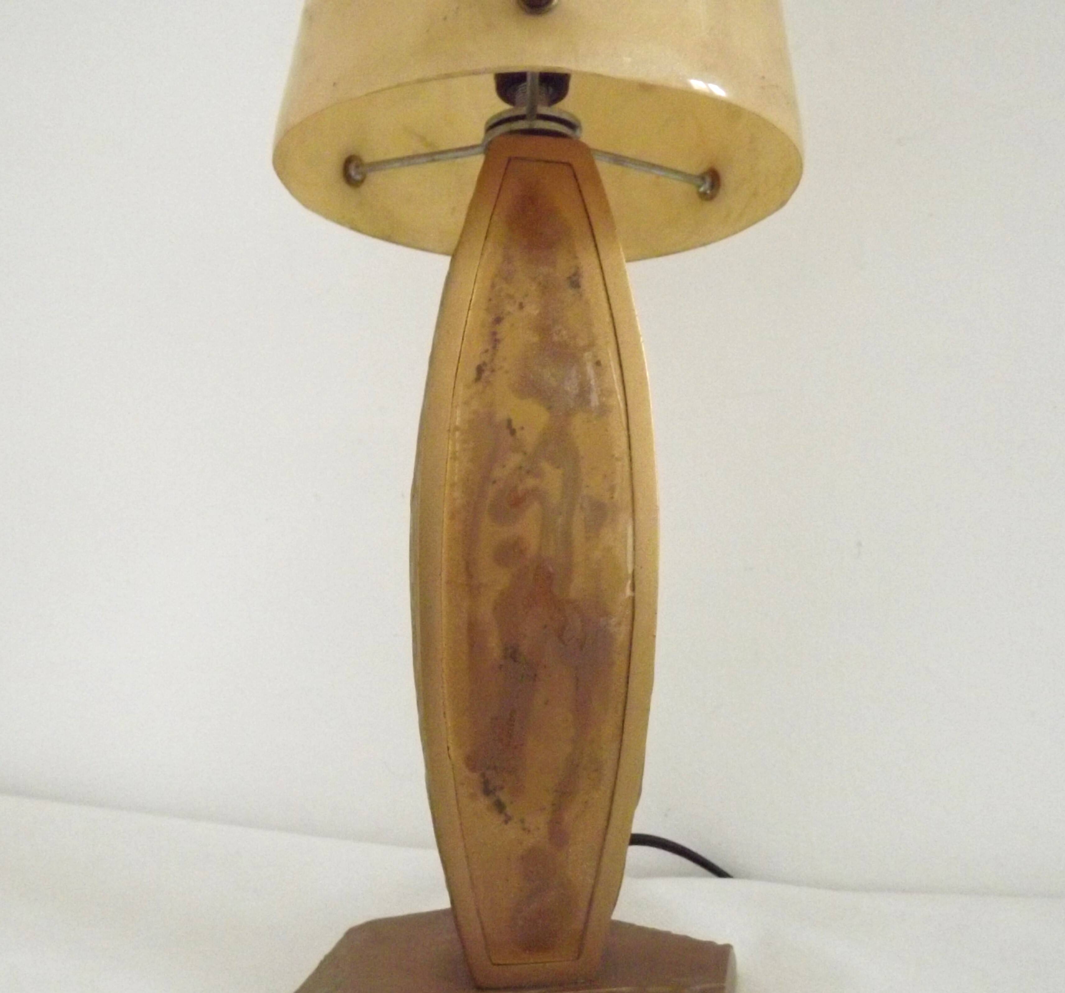 French vintage gold retro resin table lamp with marble effect cone shade.