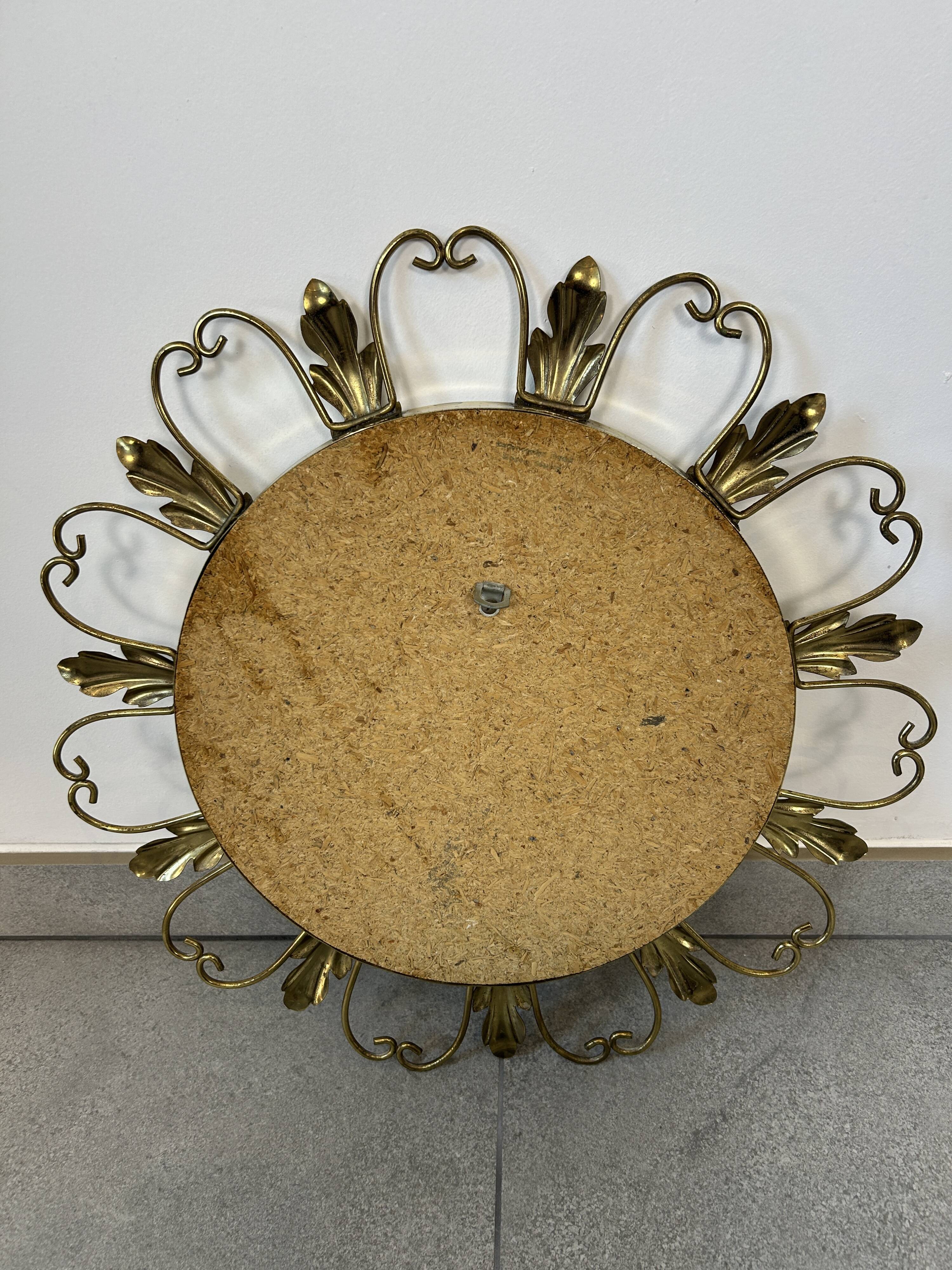 Golden metal convex sun mirror