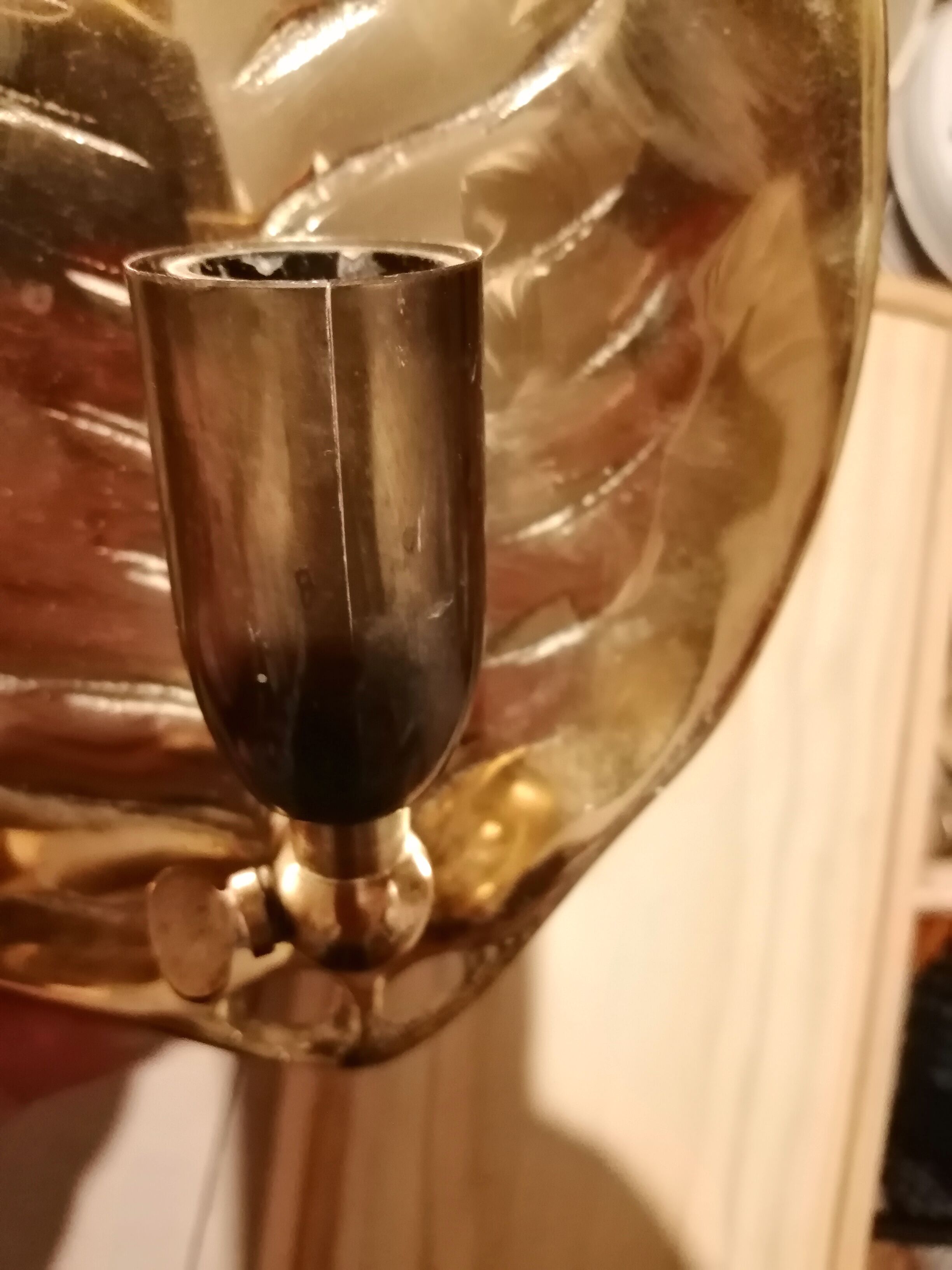 Adjustable bronze wall light with leaf decor