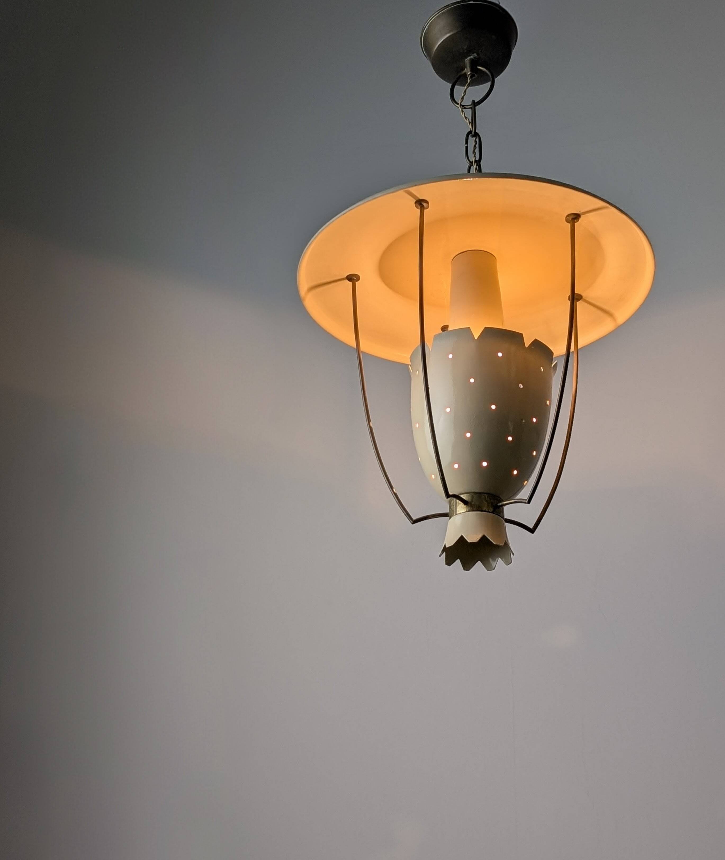 Perforated metal pendant lamp with brass details, Italy, 1940s