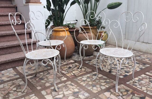 2 armchairs & 2 chairs, wrought iron1950