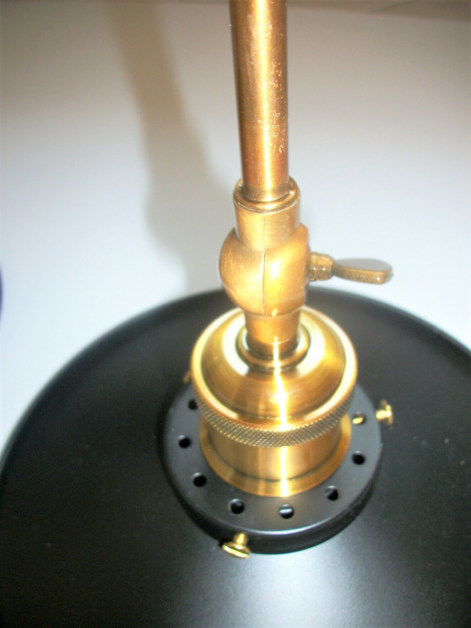Pair of metal wall lamps in black and gold