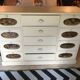 White patinated pine grain cabinet