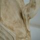 Deux ornements d'applique en bois sculpté et laqué crème,  représentant des cygnes