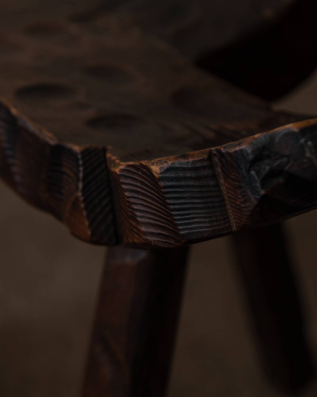 Spanish brutalist tripod chair in carved solid wood