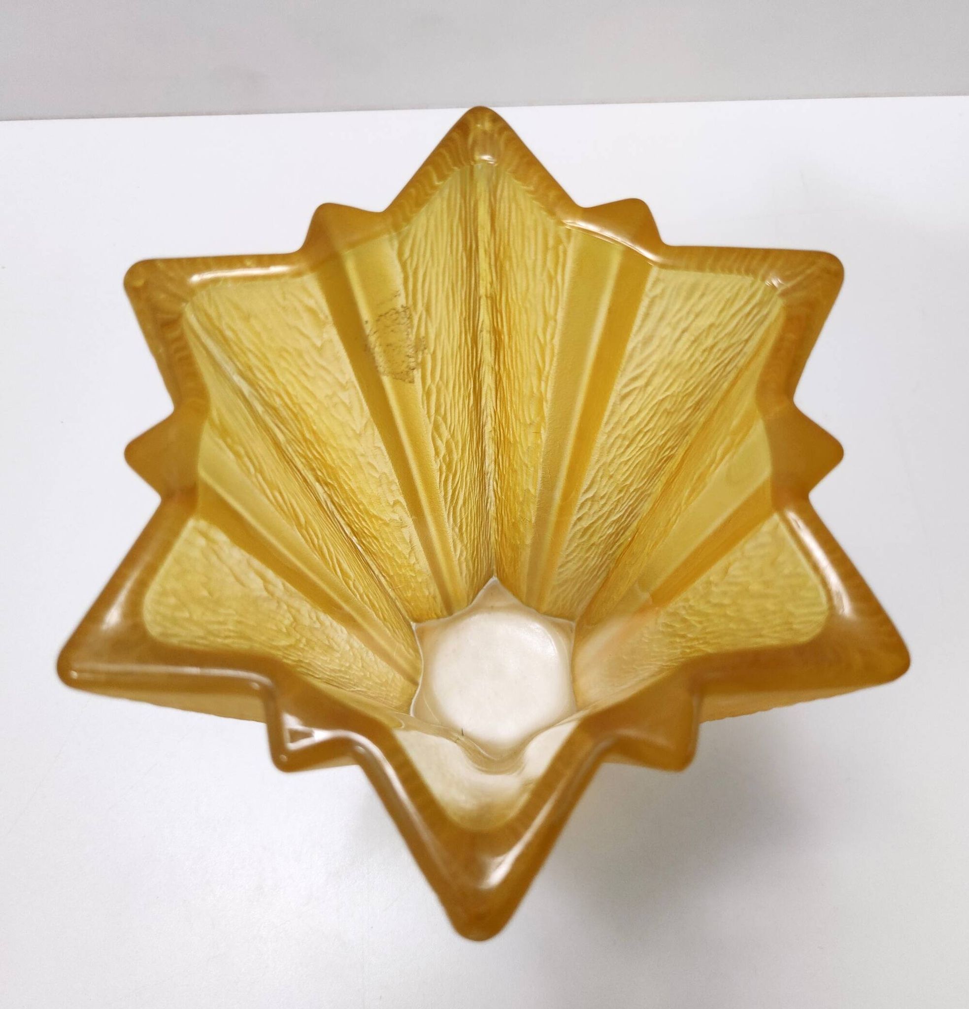 Art deco star shaped yellow glass vase attributed to pierre d'avesn for daum