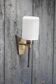 Brass wall light, black lacquered metal and white opal glass, 50s.