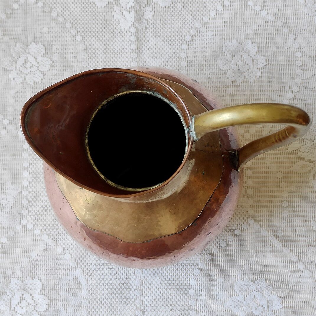 Copper and brass pitcher