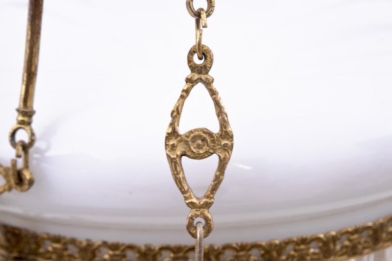 Brass chandelier from the first half of the 20th century.