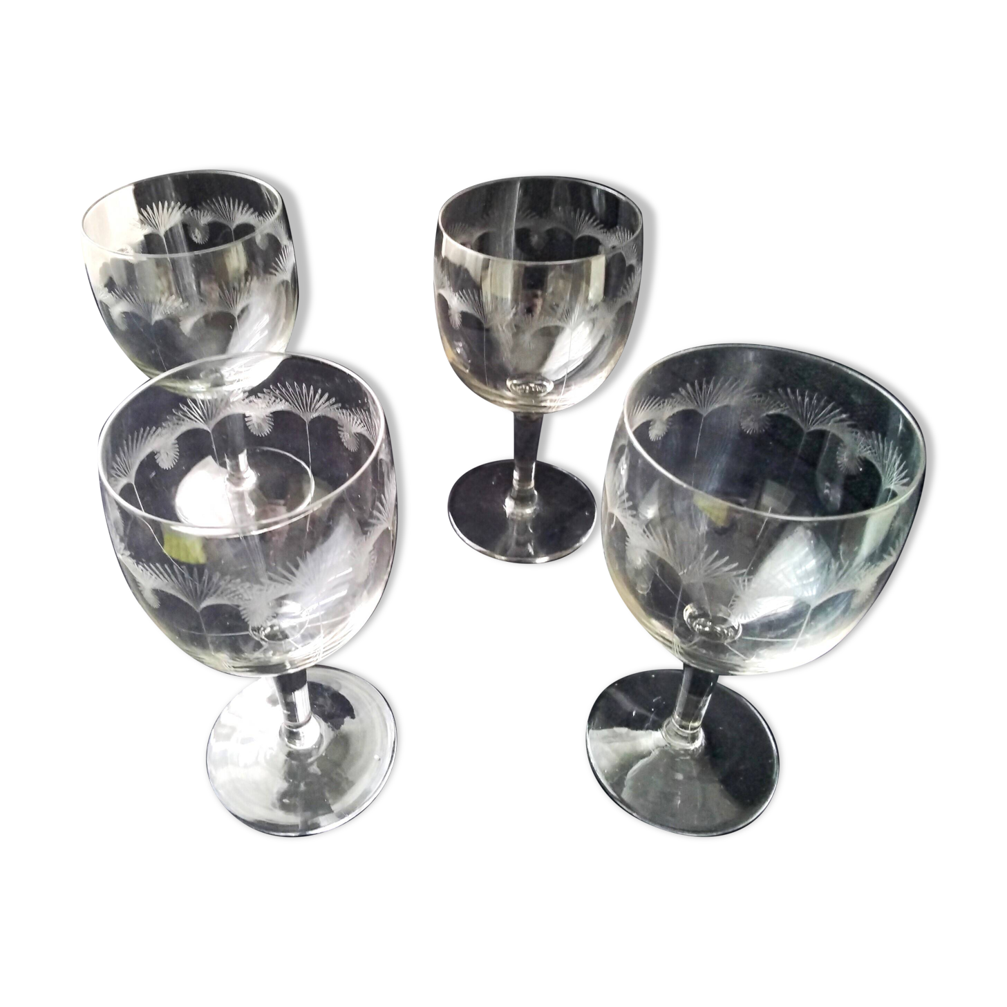 4 Antique stemmed glasses with ground decoration