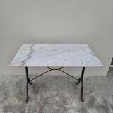 Antique cast iron and marble bistro restaurant table