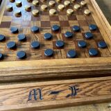 Old wooden checkers board