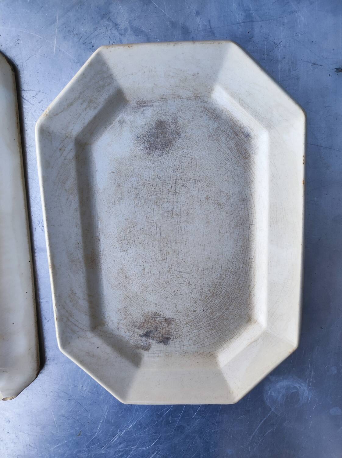 2 old earthenware dishes, one from Gien