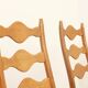 Four oak dining chairs by Henning Kjaernulf.