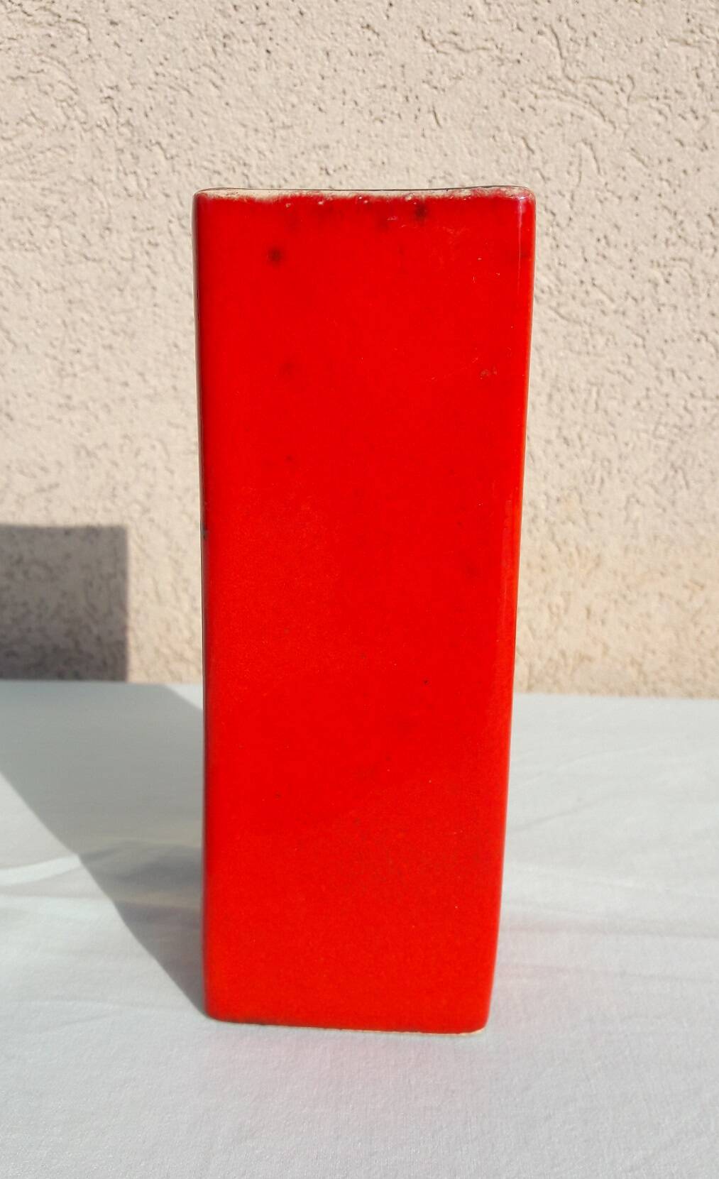 Red ceramic vase