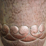 Copper vase hammered on pedestal