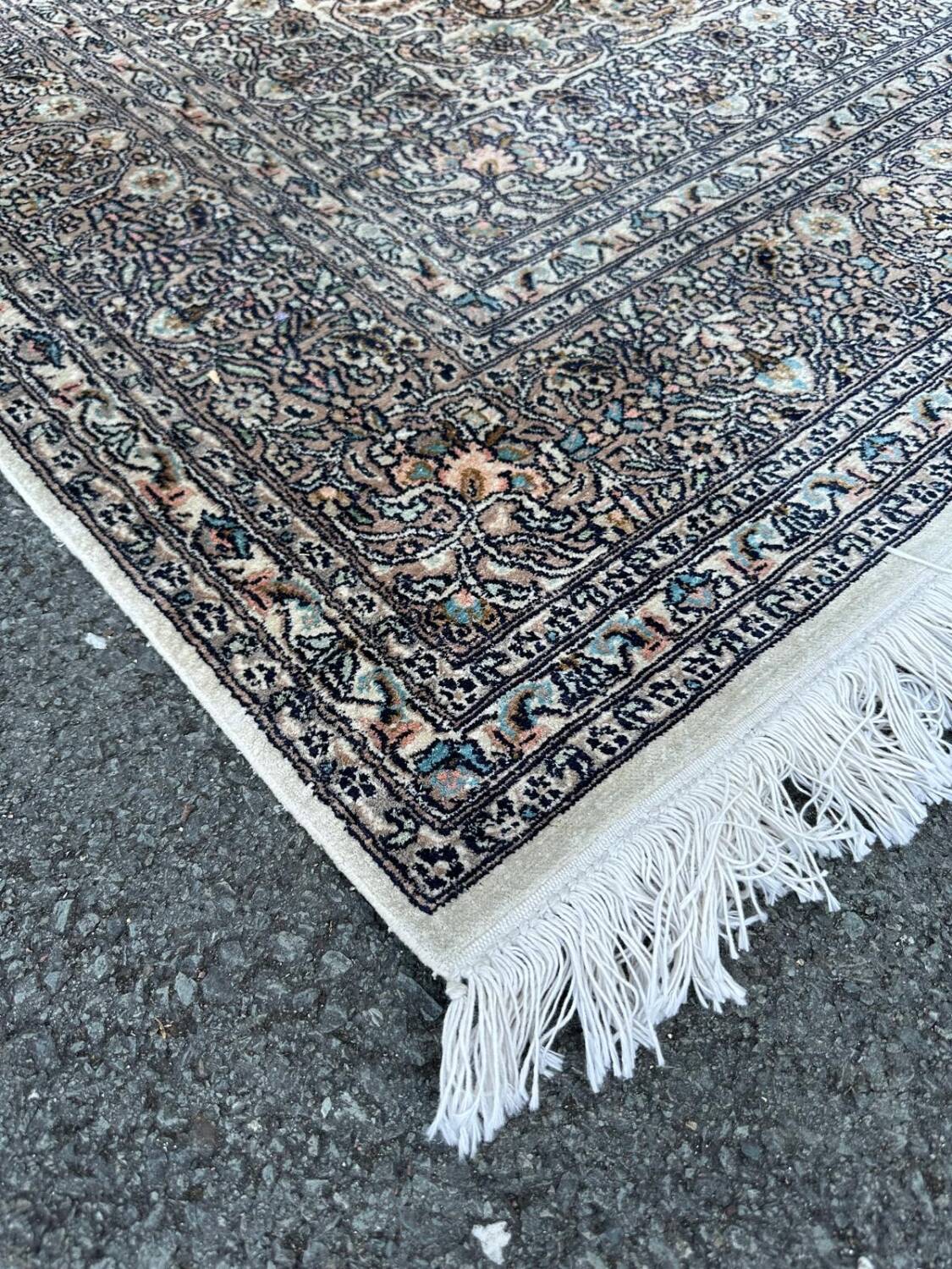 Hand-knotted Persian silk rug