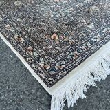 Hand-knotted Persian silk rug