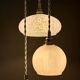 Vintage white glass triple globe suspension from Clichy and opaline.