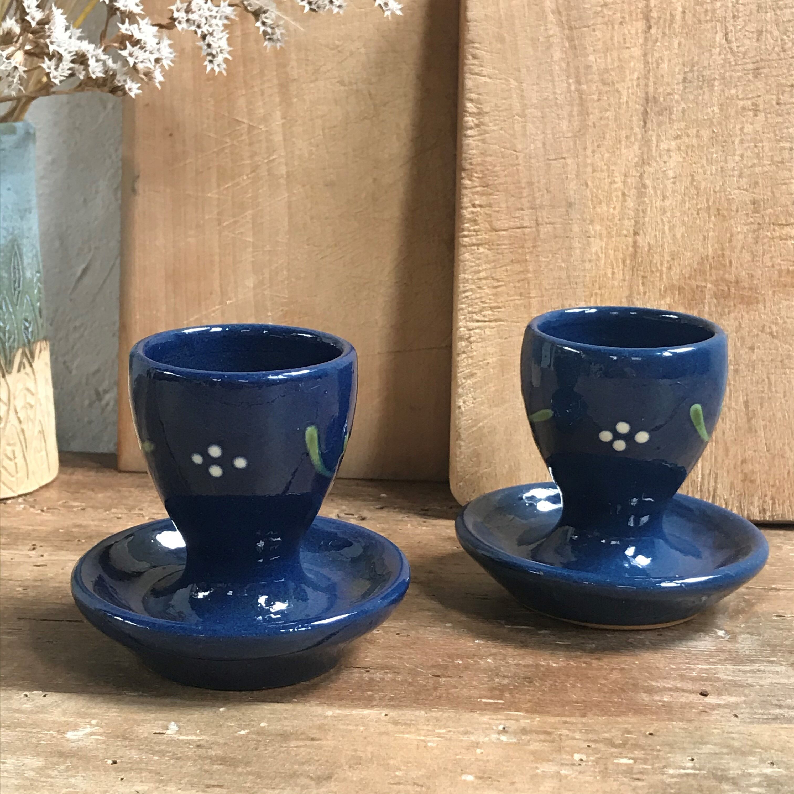 Pair of ceramic cockroaches