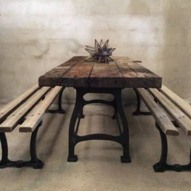 Industrial dining table with cast iron base