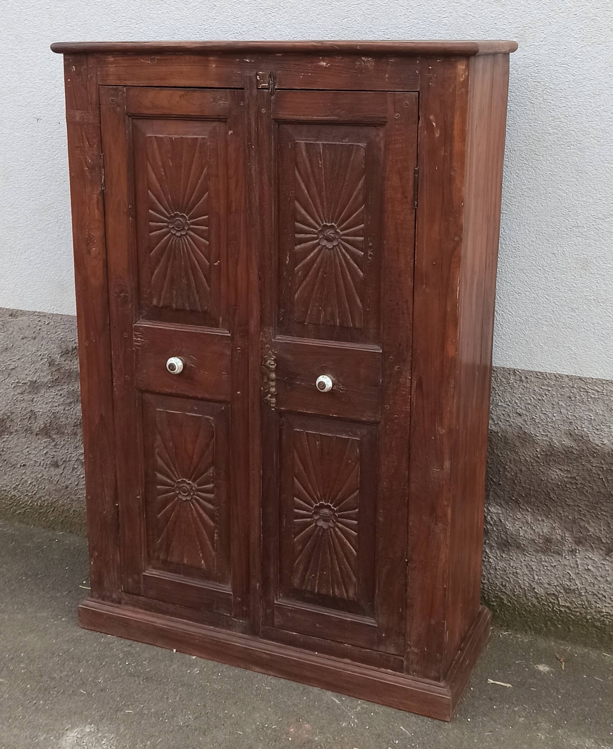 Old wooden cabinet with ceramic handles