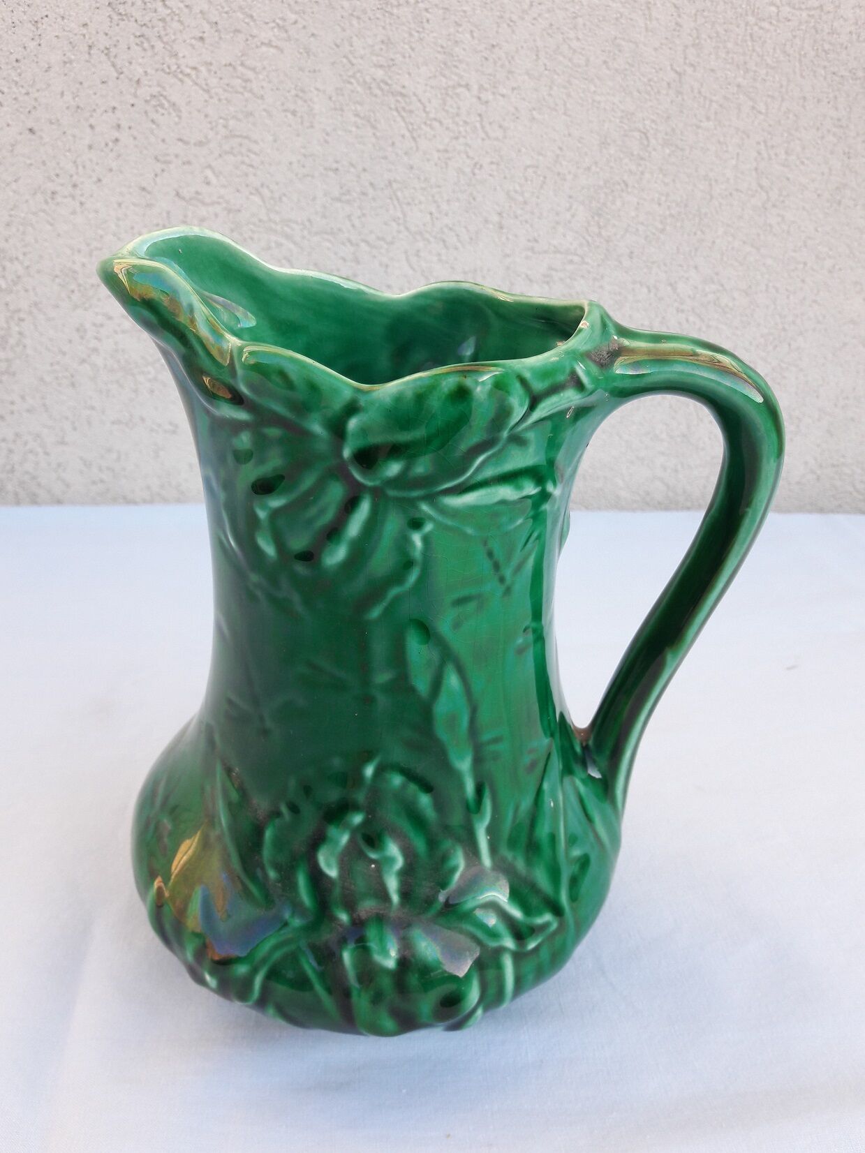 Green ceramic pitcher