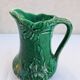 Green ceramic pitcher