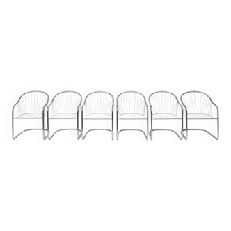 6 chrome metal chairs in the style of Gastonne Ronaldo.