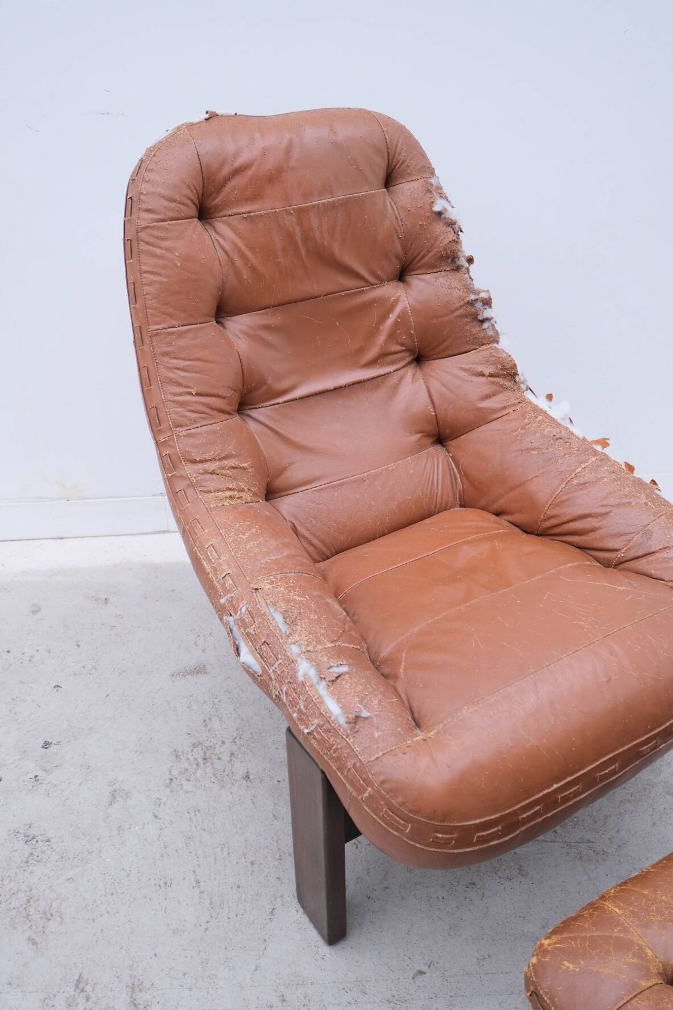 Armchair and ottoman by Jean Gillon for Probel in leather and teak, Brazil 1970