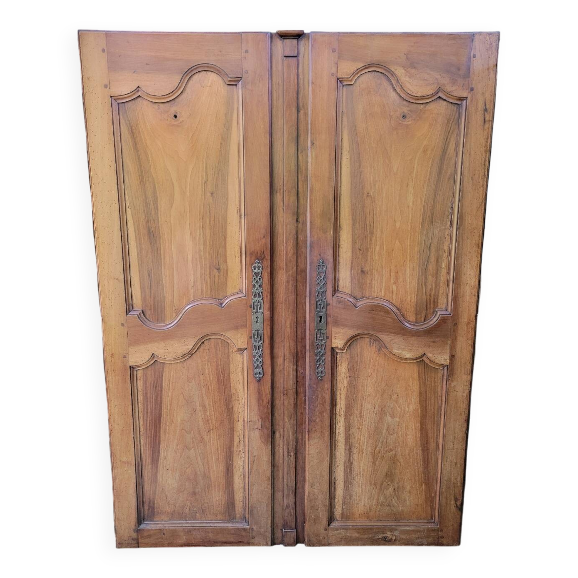 Double old wardrobe doors in walnut from around 1900.