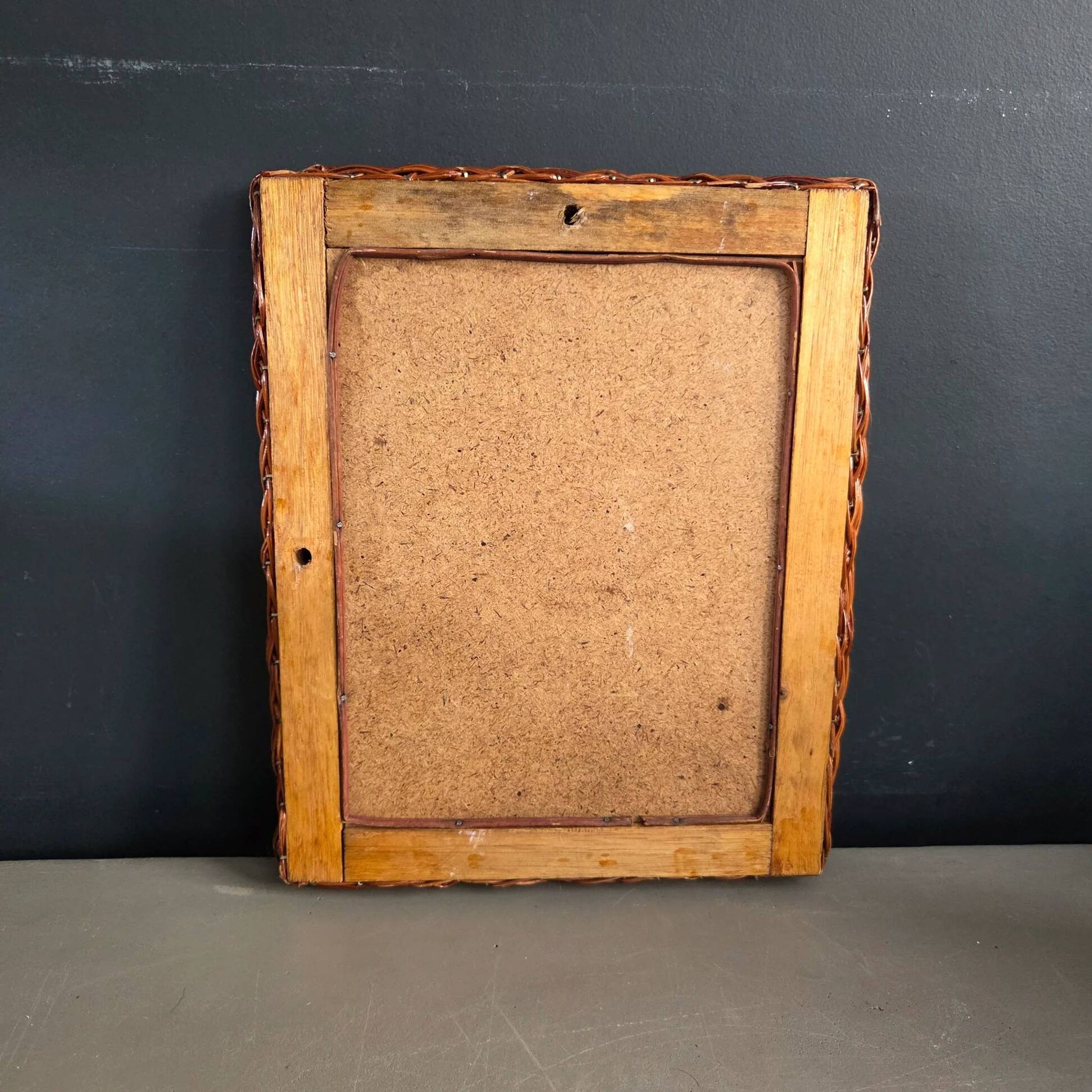 Vintage woven rattan mirror