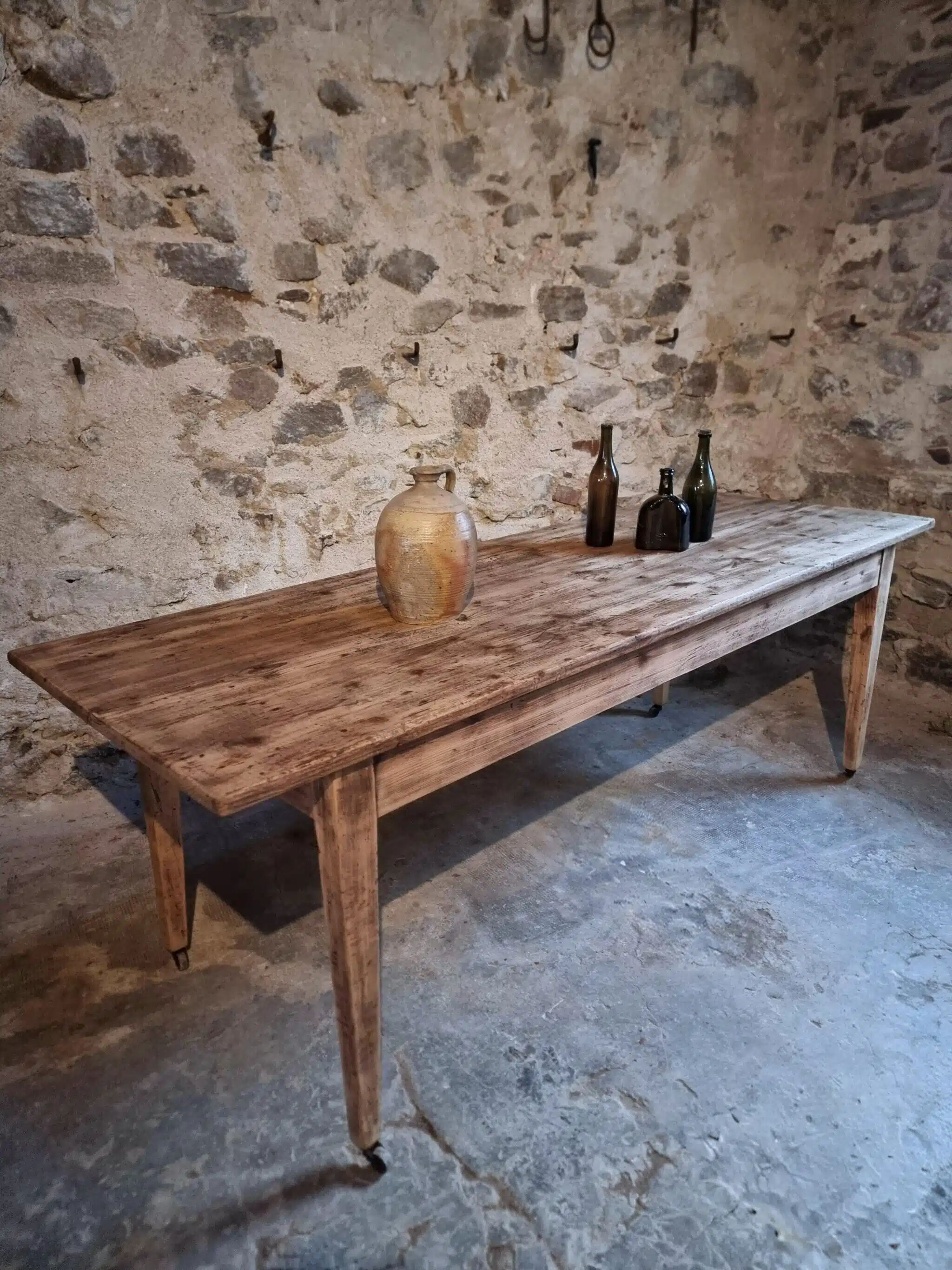 Antique French pine dining table, large farmhouse table on wheels, 19th century.